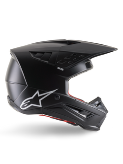 Alpinestars S-M5 Solid Helmet, Motocross Helmet, Matte Black, featuring white Alpinestars star logo and red interior lining, aerodynamic design with multiple air vents and long visor, ECE 22.06 certified off-road protection