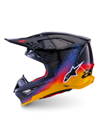 Alpinestars Limited Edition Supertech M10 Black Hole Helmet, Motocross Helmet, Black Burst Glossy finish with vibrant blue, red, and yellow gradient splatter, side profile view showing white Astars logo and carbon fiber shell textures.