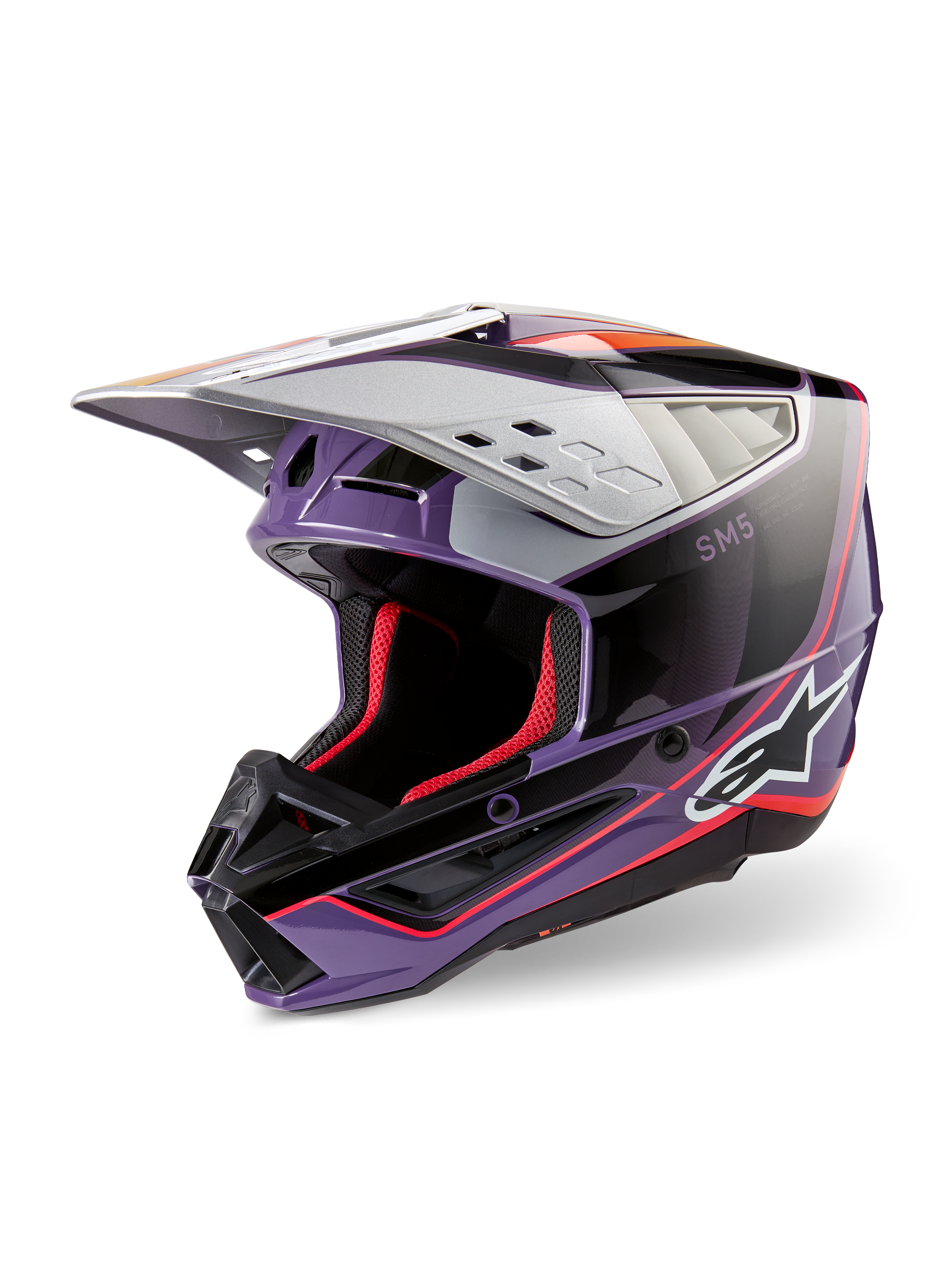 Capacete Alpinestars S-M5 Sail ECE, capacete de motocross, violeta, preto e prateado brilhante, com forro interno e detalhes em vermelho, acabamento brilhante com logótipo Alpinestars em destaque, viseira prateada aerodinâmica, equipamento de proteção profissional para todo-o-terreno