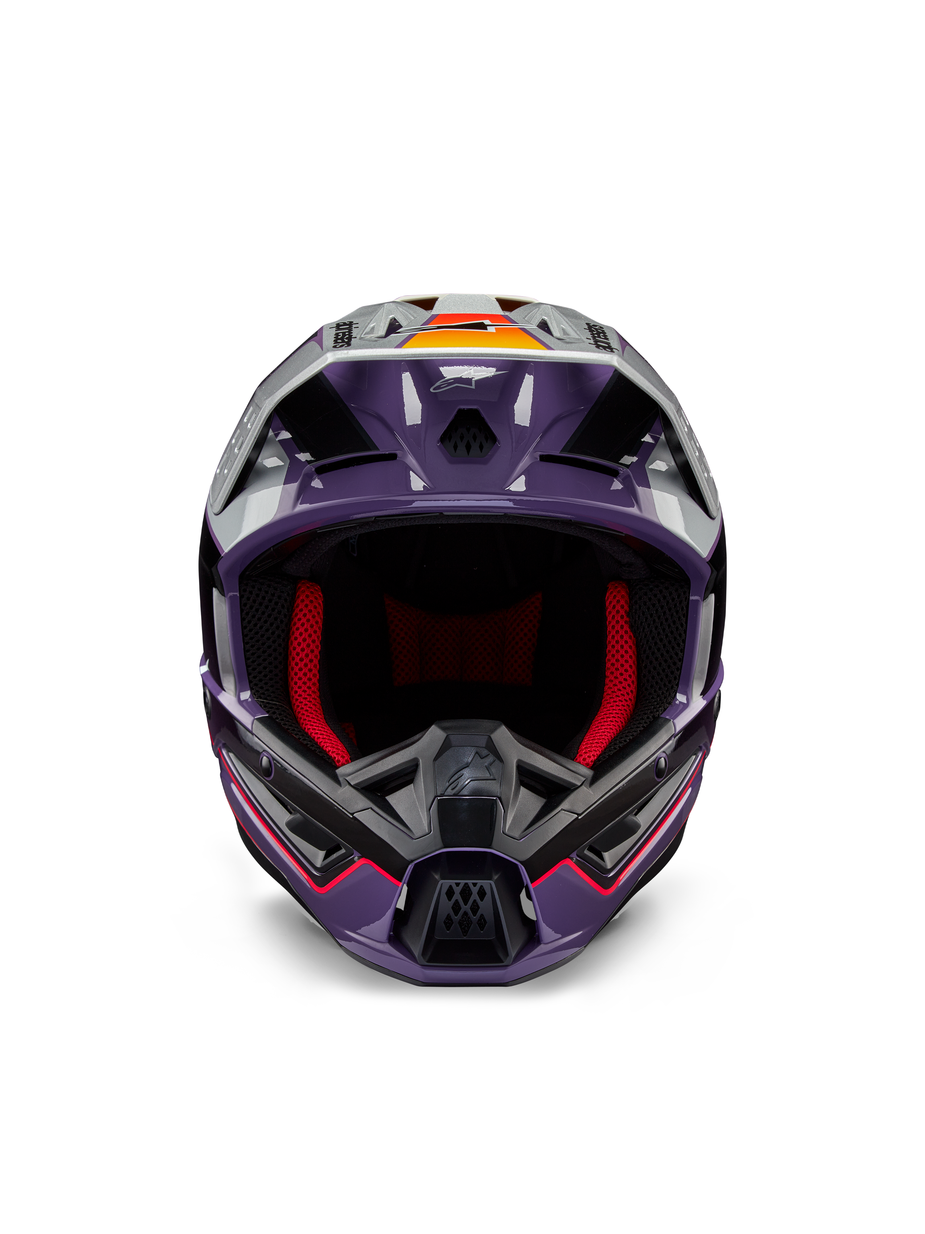 Alpinestars S-M5 Sail Helmet ECE, capacete de motocross, violeta, preto e prateado brilhante, vista frontal com acolchoamento interior vermelho, queixeira ventilada e viseira com detalhes em laranja, calota aerodinâmica elegante para proteção em todo-o-terreno