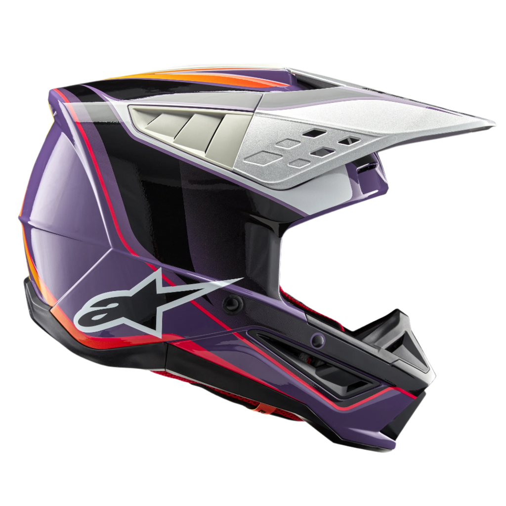Alpinestars S-M5 Sail Helmet ECE, capacete de motocross, roxo, preto e prateado brilhante, com grafismos arrojados em laranja e vermelho, viseira prateada ventilada, calota aerodinâmica com logótipo de estrela branco, proteção profissional para todo-o-terreno