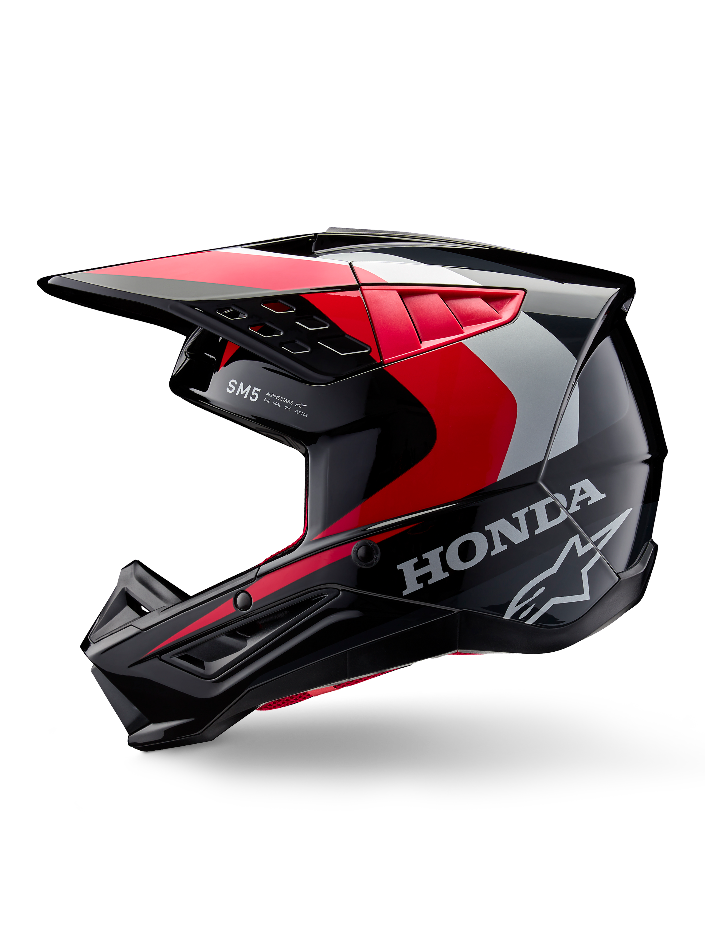 Capacete Alpinestars Honda S-M5, capacete de motocross, preto, vermelho e prateado brilhante, vista de perfil lateral com marca Honda e logótipo da estrela Alpinestars, design elegante com pala integrada e aberturas de ventilação para performance todo-o-terreno