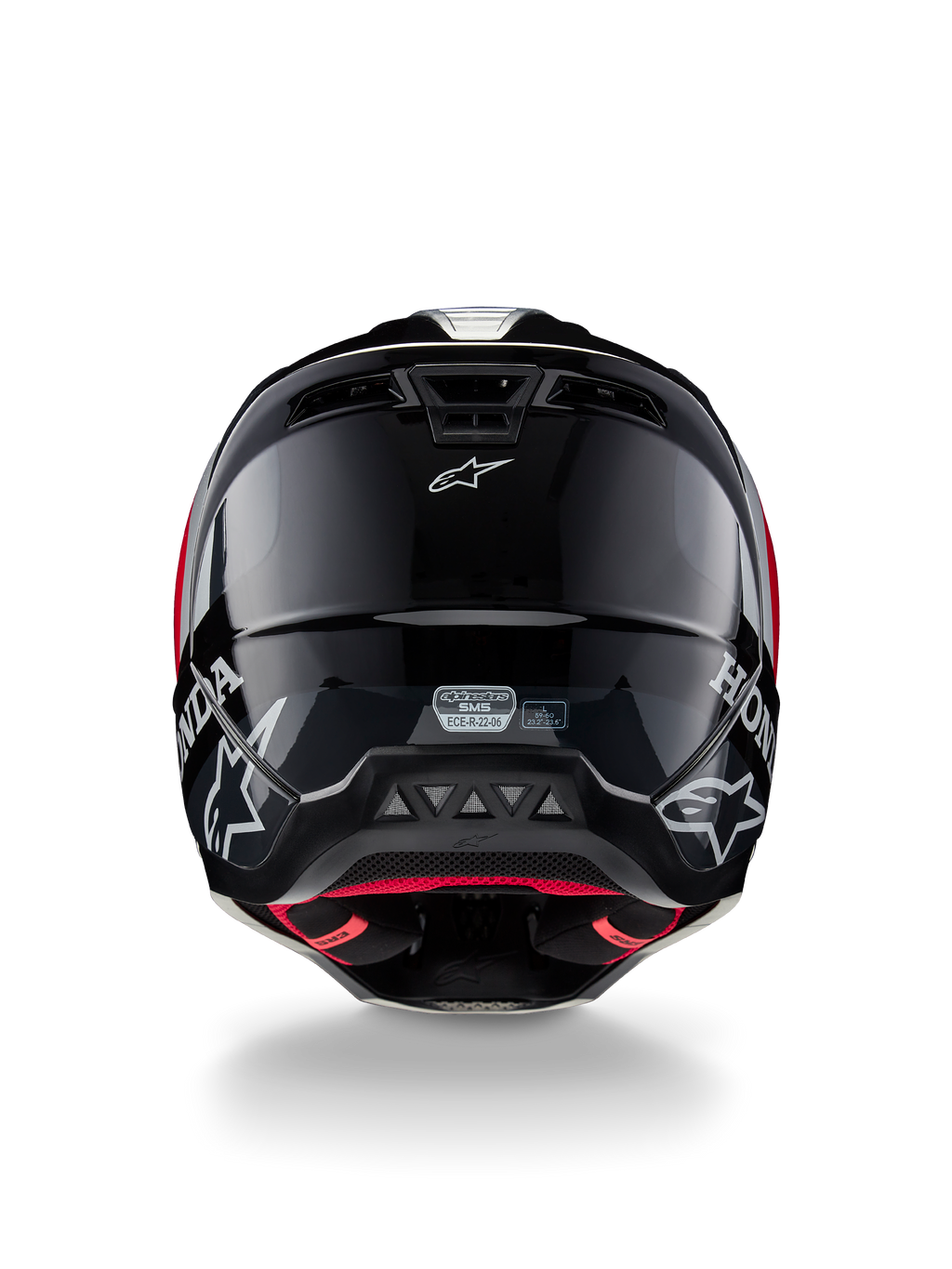 Capacete Alpinestars Honda S-M5 ECE, capacete de motocross, preto e vermelho brilhante, vista traseira mostrando a concha preta brilhante com logótipos Honda e Alpinestars brancos, forro interno vermelho e etiqueta de certificação de segurança ECE