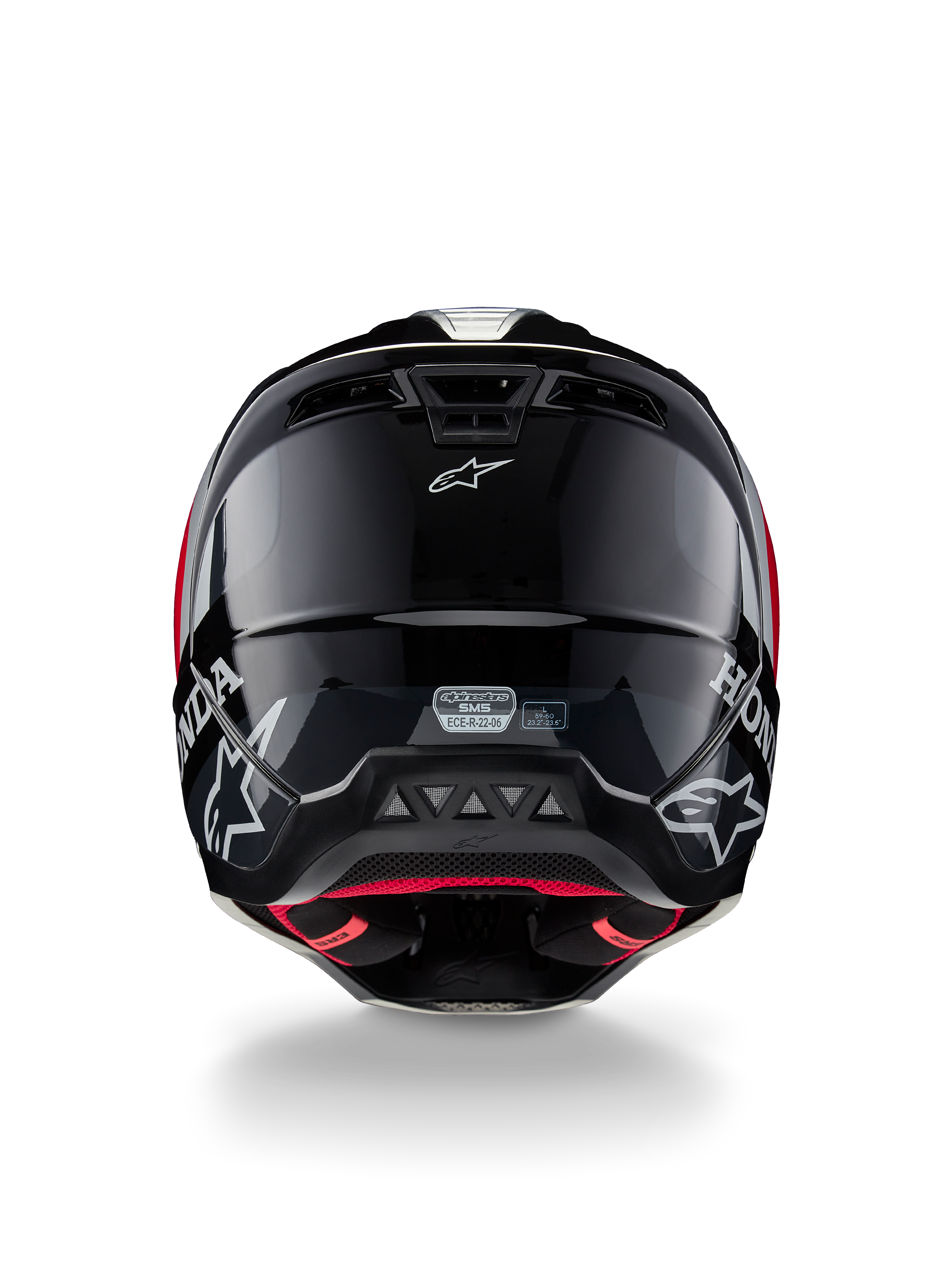Capacete Alpinestars Honda S-M5 ECE, capacete de motocross, preto e vermelho brilhante, vista traseira mostrando a concha preta brilhante com logótipos Honda e Alpinestars brancos, forro interno vermelho e etiqueta de certificação de segurança ECE
