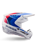 Alpinestars Honda S-M5 Helmet ECE, capacete de motocross, branco, azul e vermelho, vista de perfil lateral, design aerodinâmico com viseira integrada, múltiplas aberturas de ventilação, acabamento brilhante, marca Honda em destaque e logótipo Alpinestars
