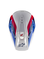 Alpinestars Honda S-M5 Helmet ECE, capacete de motocross, branco, azul e vermelho brilhante, vista superior com destaque para os canais de ventilação, com grafismos em vermelho e azul e logótipos da Honda e Alpinestars