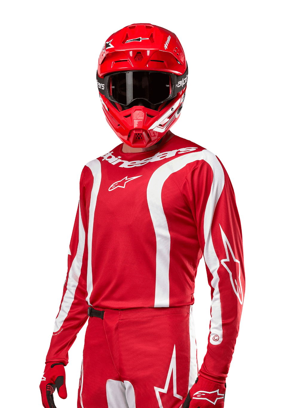 Alpinestars 2024 Fluid Lurv Jersey, camisola de motocross, vermelho Mars e branco, usada com capacete e luvas vermelhas a condizer, design desportivo arrojado com riscas curvas brancas e logótipos Alpinestars
