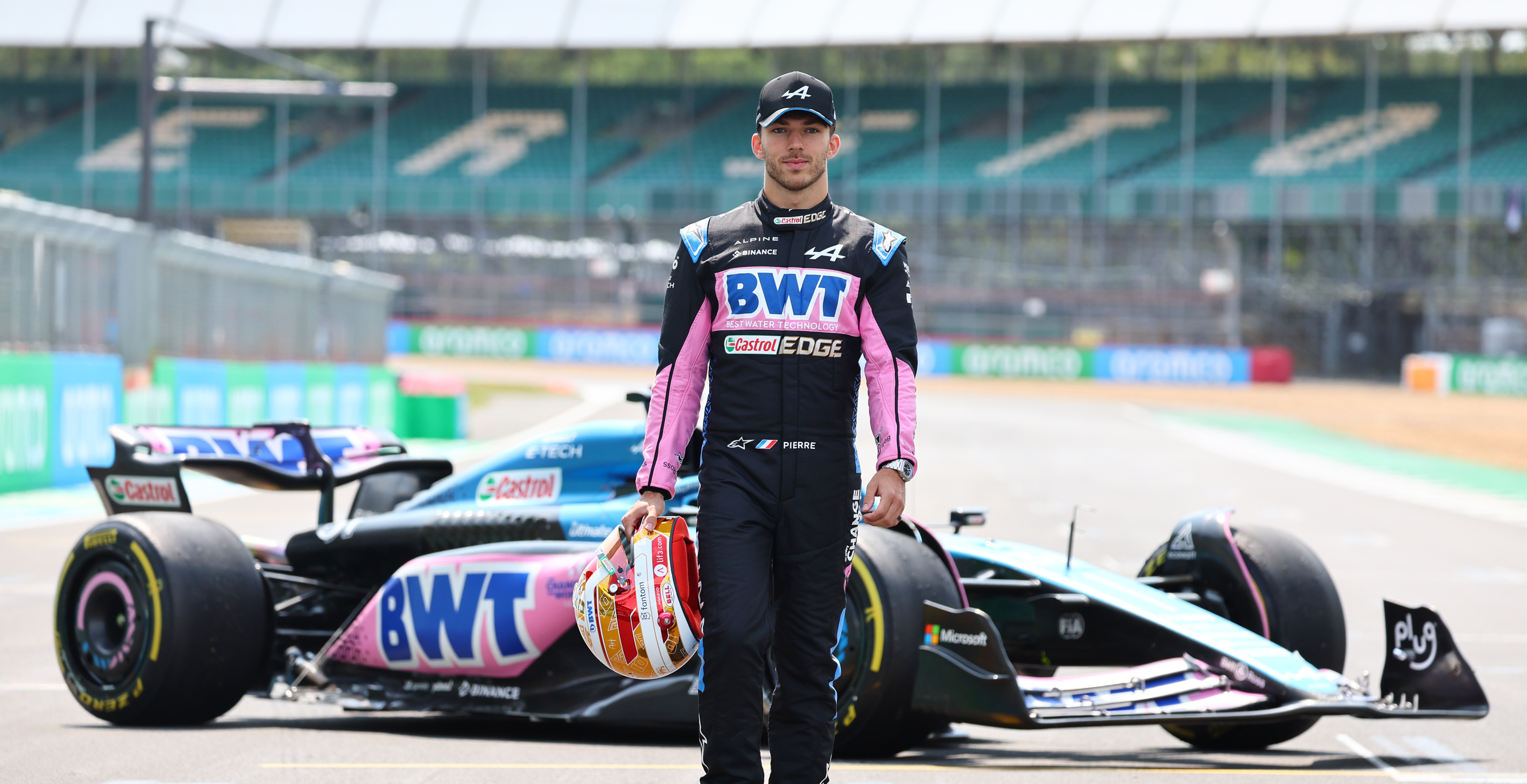 Pierre Gasley in front of his F1 car