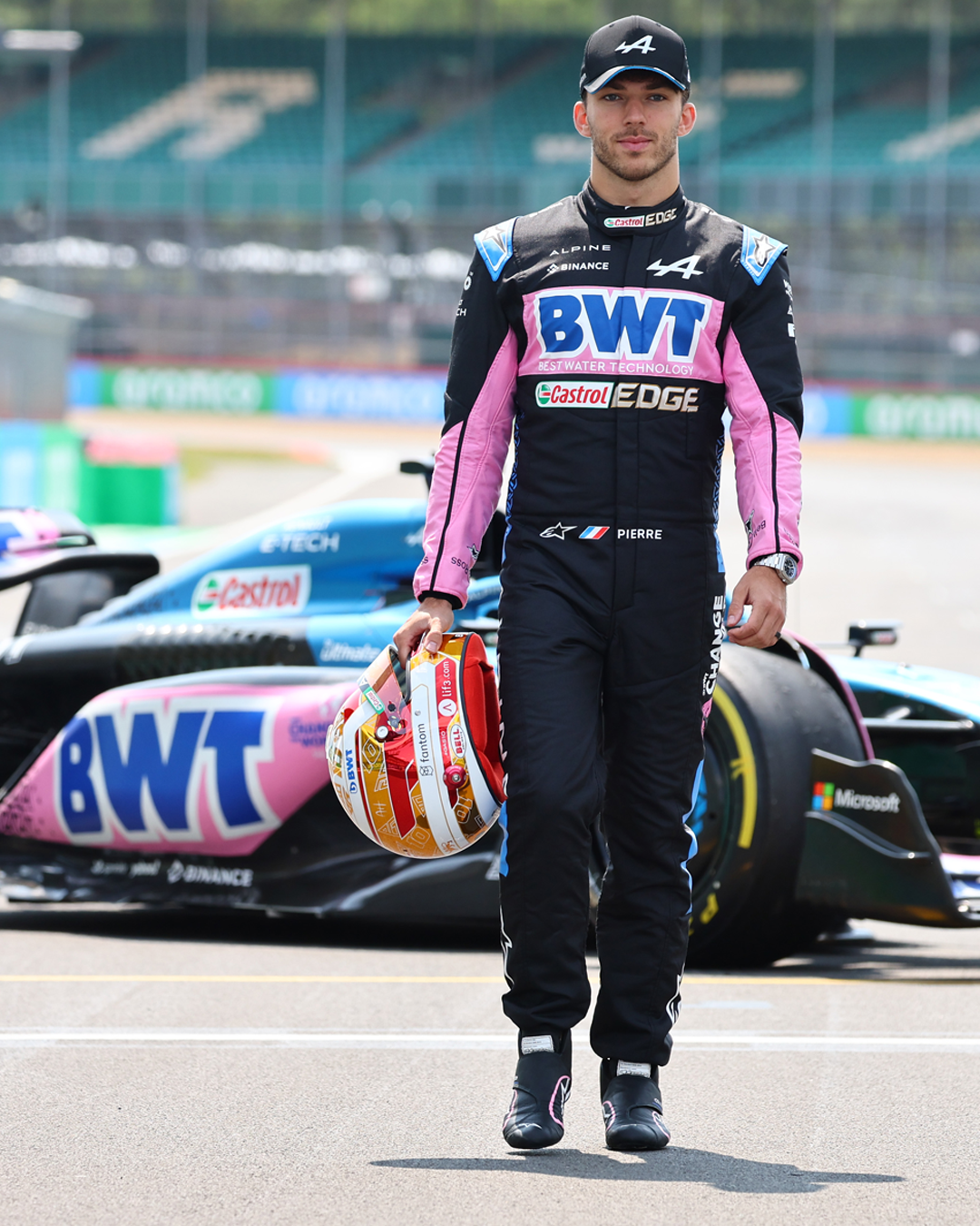 Pierre Gasley in front of his F1 car