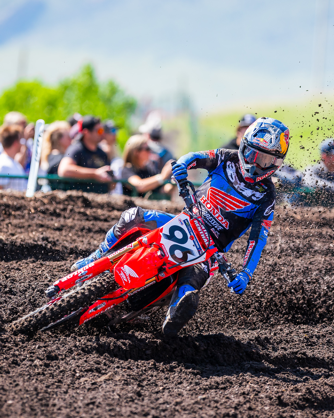 Hunter Lawrence wearing Alpinestars mx gear in action on a dirt track with spectators in the background