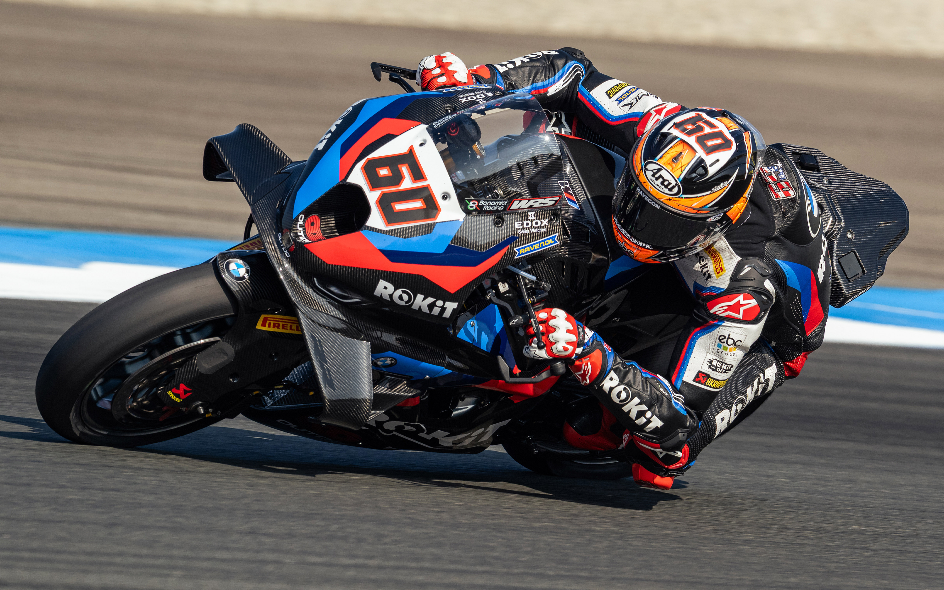 Michael van der mark leaning his Superbike BMW wearing Alpinestars protections