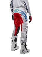 Alpinestars 2024 Racer Hana Pants, Motocross Pants, White Multicolor with red and blue accents, rear view showing large branding on the seat, worn with white and black motocross boots, designed for off-road performance and durability