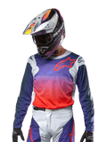 Alpinestars 2024 Racer Hoen Jersey, Motocross Jersey, Purple and Hot Orange Gradient with Dark Blue Sleeves, Light Gray shoulder panels, worn with matching racing pants and helmet, complete off-road riding gear