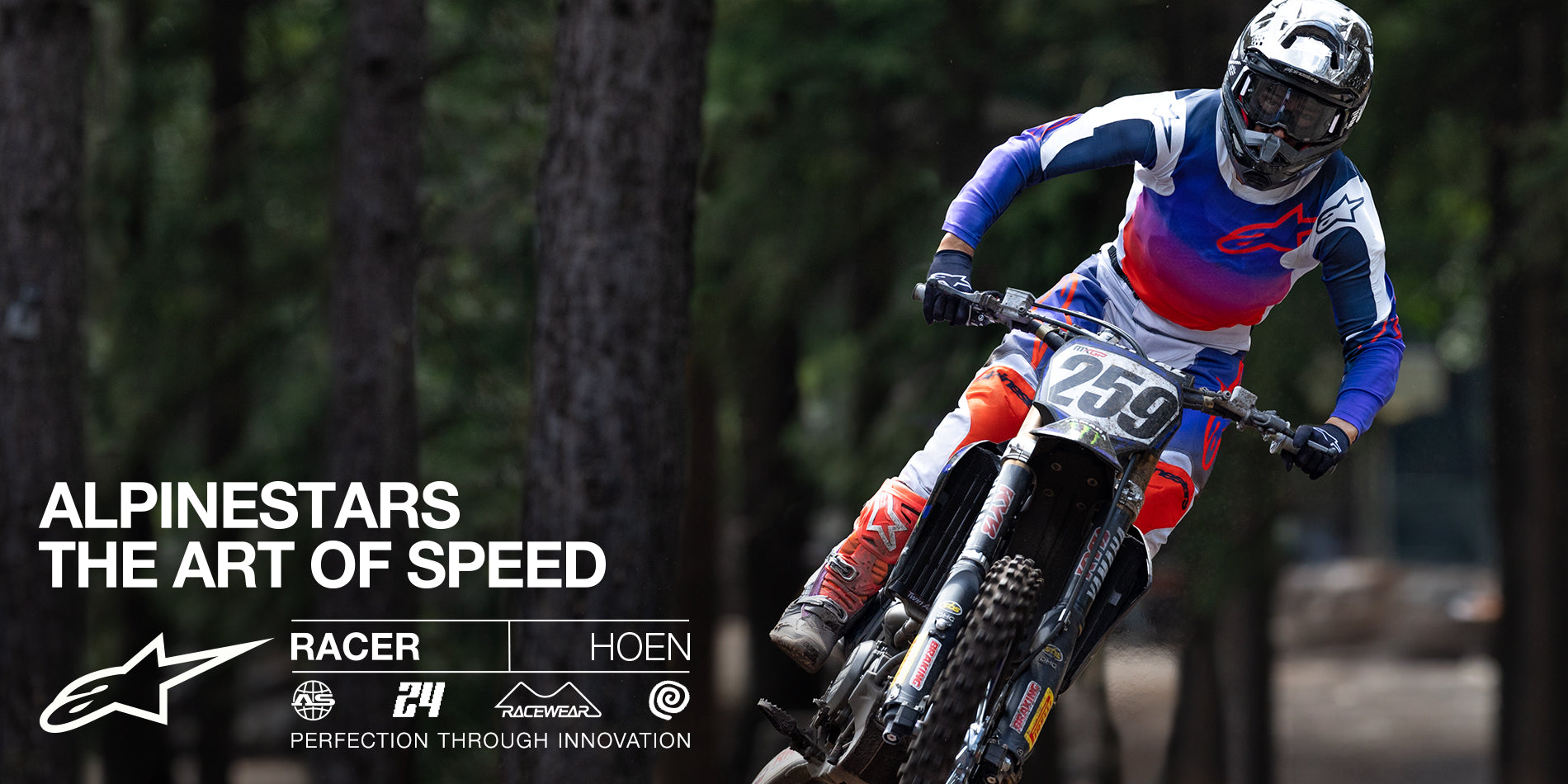 Alpinestars 2024 Racer Hoen Jersey and Pants, blue and red motocross gear, worn by a professional rider in action.
