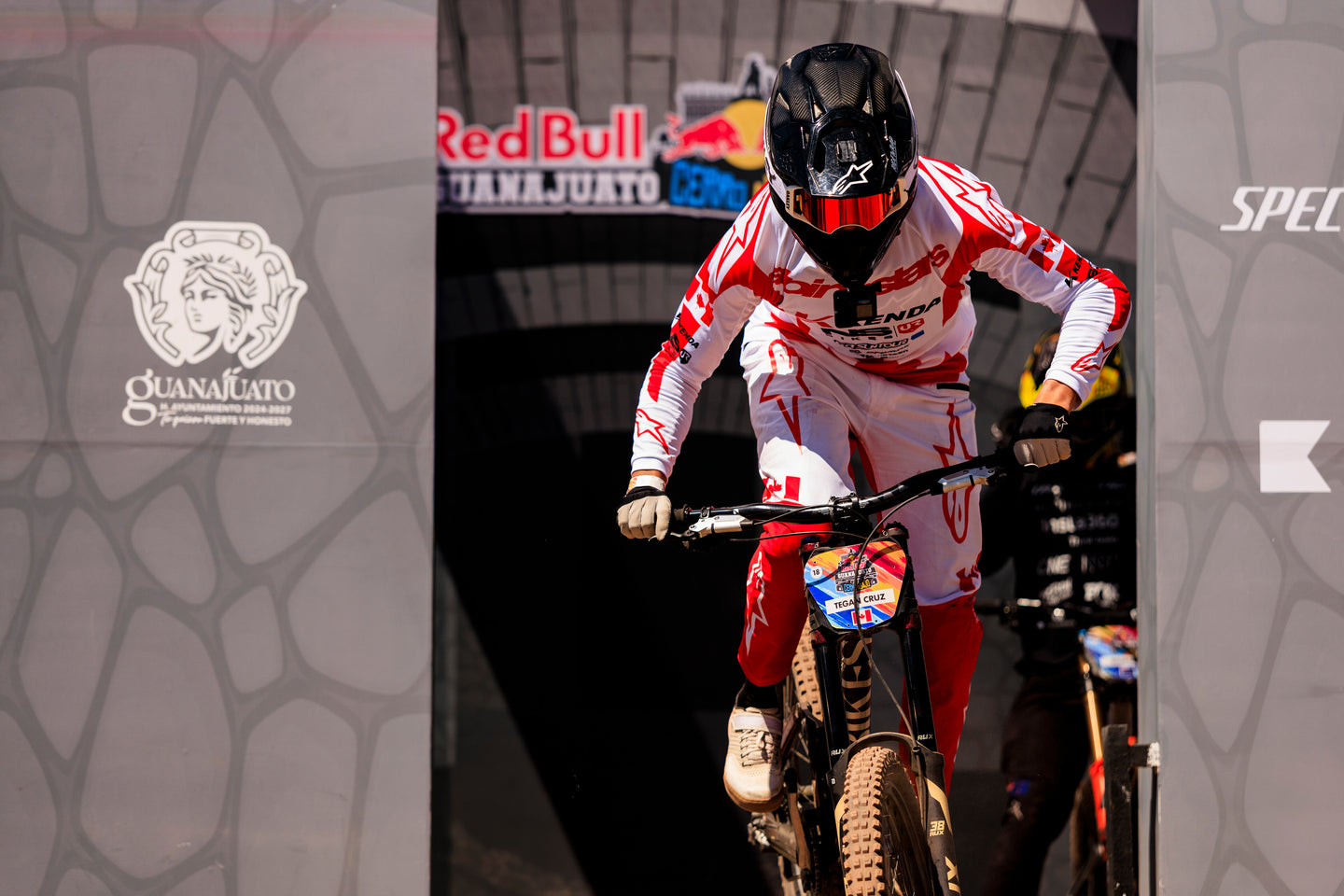 Tegan Cruz wearing Alpinestars head to toe, just off the starting block during a downhill race