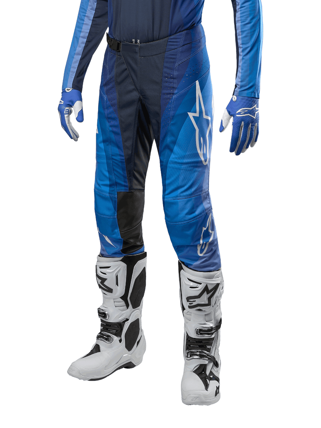 Alpinestars 2024 Techstar Pneuma Pants, Motocross Pants, Dark Navy and Light Blue, worn with matching blue jersey and white boots, featuring white logo on thigh, textured grip areas, sleek sporty design for off-road racing