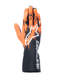 Luvas Alpinestars Tech-1 K V3, luvas de karting, preto, laranja e branco, com design gráfico sublimado de pinceladas laranja sobre base preta, logótipo Astar grande em branco, texto vertical Alpinestars no punho, equipamento profissional de karting