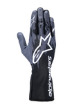 Luvas Alpinestars Tech-1 K V3, luvas de karting, em preto antracite, com um grande logótipo Astar branco nas costas da mão, padrão estilo camuflagem cinzento-escuro e punho de manopla com a marca Alpinestars branca na vertical