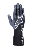 Luvas Alpinestars Tech-1 K V3, luvas de karting, em preto antracite, com um grande logótipo Astar branco nas costas da mão, padrão estilo camuflagem cinzento-escuro e punho de manopla com a marca Alpinestars branca na vertical