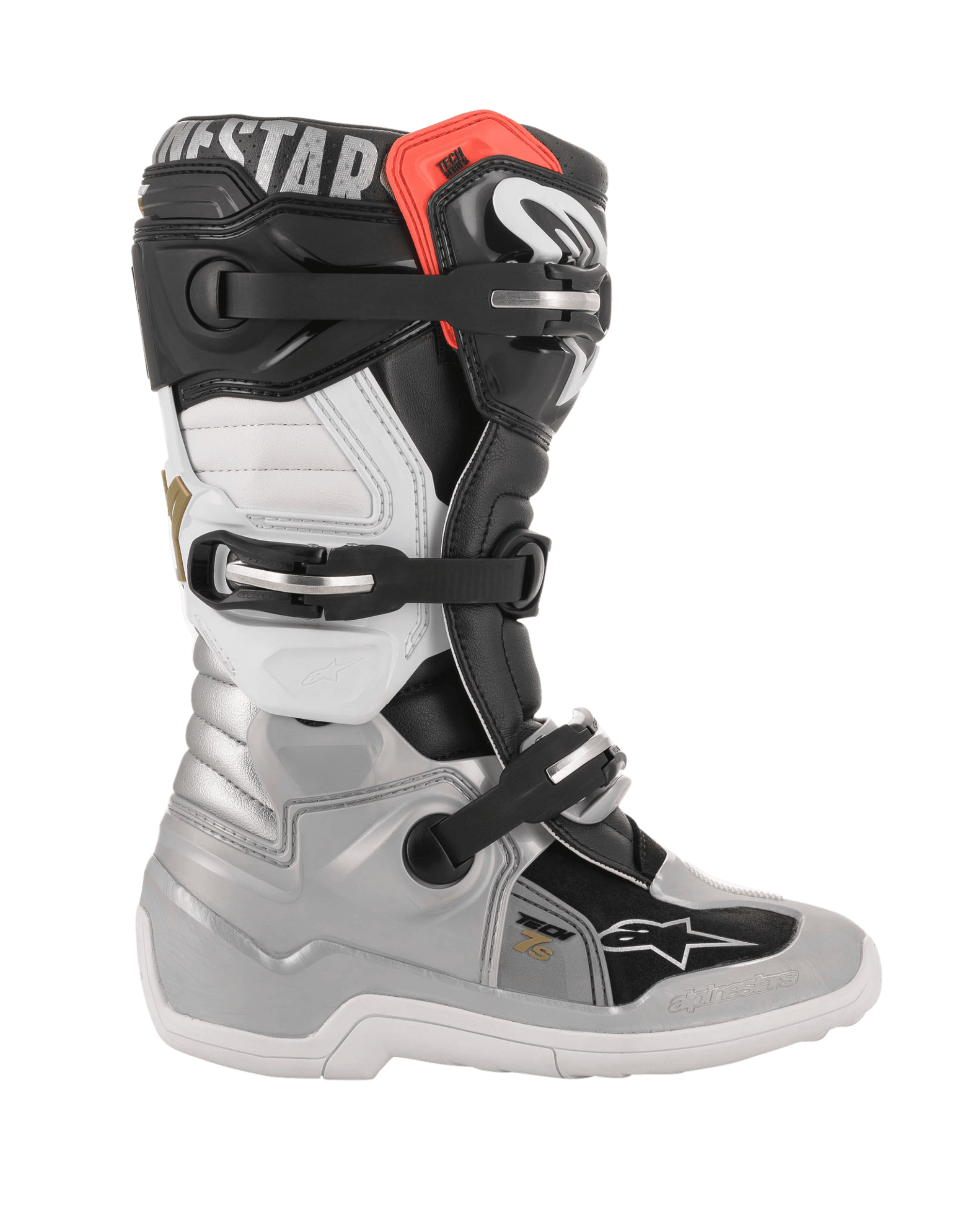 Botas Alpinestars Tech 7S Jovem, botas de motocross, preto, prateado, branco e dourado, vista de perfil lateral com estrutura inferior prateada, painéis superiores pretos e brancos, detalhe vermelho no topo do cano e sistema de fecho com três fivelas