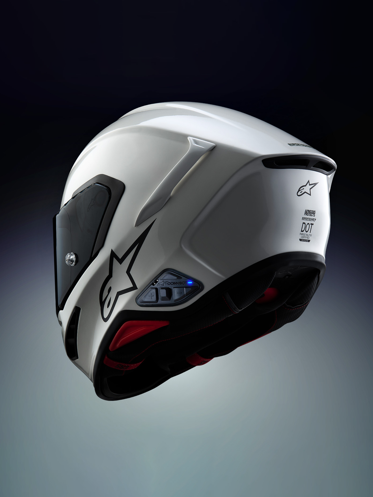 Alpinestars A-Connect Communication System installed on an Alpinestars S-R7 Motorcycle Helmet, White and Black, featuring Mesh 3.0 intercom and Bluetooth 5.3 control unit with active blue LED status light
