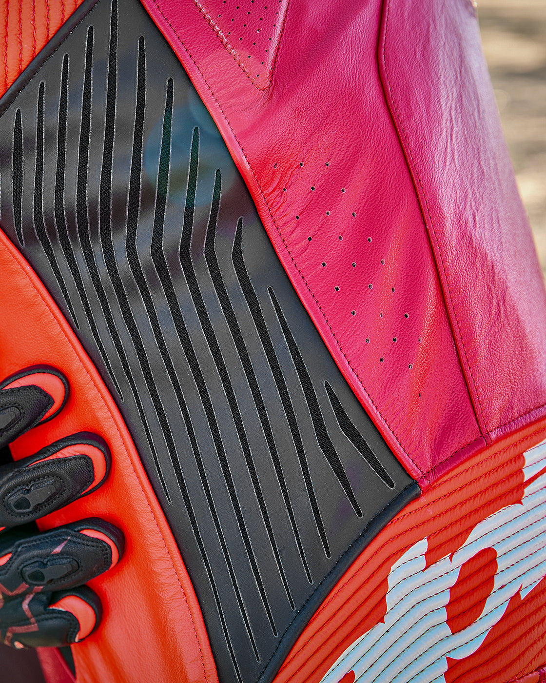 Alpinestars GP Plus V4 Sprint Leather Suit in Red and Black with A-CS composite stretch and perforated leather.